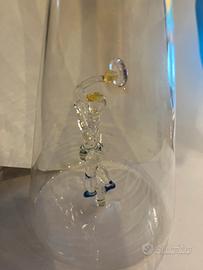 Bottiglia di vetro lavorata