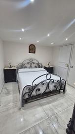 Letto in Ferro Battuto e Trittico Legno e Marmo 
