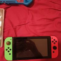  nintendo switch + carica batterie e cover