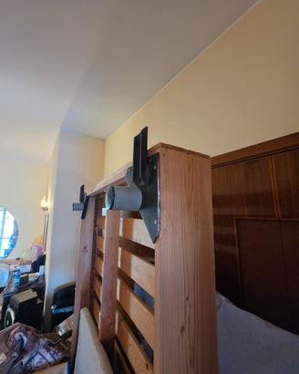 Letto una piazza e mezzo in legno