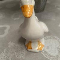 Paperella vintage in ceramica bianca e