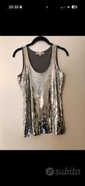 Top in pailettes argentate