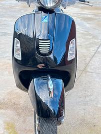 Vespa 125 con bauletto