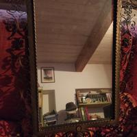 Specchio con cornice in ferro battuto