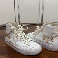 Nike blazer con dettagli oro