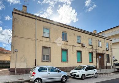 Primo piano in palazzina storica, Fertilia