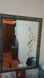 specchio con cornice con pavone dipinto a mano