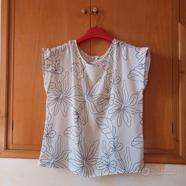 Blusa con mezze maniche