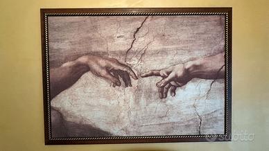 quadro con cornice intagliata a mano
