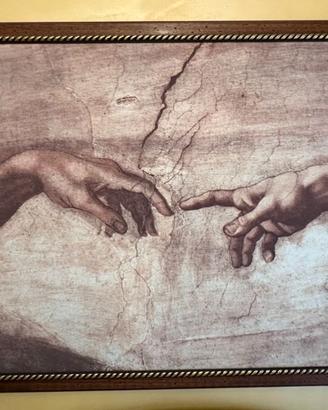 quadro con cornice intagliata a mano
