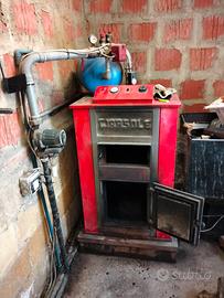 Caldaia  biomassa  Legna sansa e triturati vari