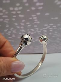 Bracciale rigido con teschietti  argento 
