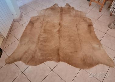 tappeto in pelle di vacchetta