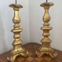 Antichi candelabri in legno del “700 foglia oro