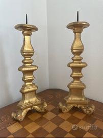 Antichi candelabri in legno del “700 foglia oro