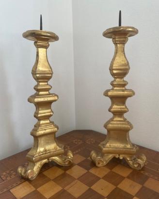Antichi candelabri in legno del “700 foglia oro