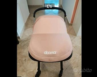DOONA Seggiolino auto Rosa Blush + isofix DOONA