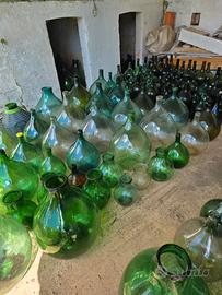 Damigiane in vetro artigianato d'epoca