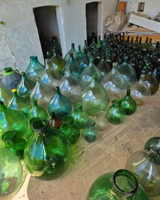 Damigiane in vetro artigianato d'epoca
