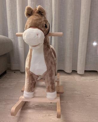 cavallo a dondolo in peluche con suoni