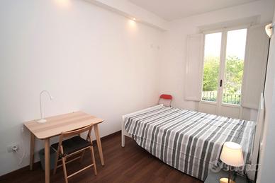 Ampia camera con bagno e balcone privati