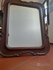 Specchio con cornice in legno