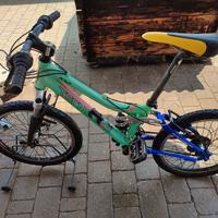bicicletta ragazzo/a con ammortizzatori e marce