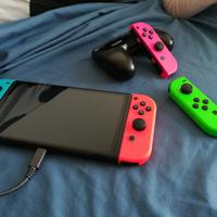 Nintendo Switch Oled +JoyCon + accessori