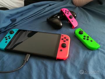 Nintendo Switch Oled +JoyCon + accessori
