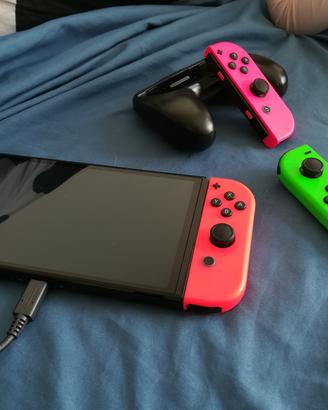 Nintendo Switch Oled +JoyCon + accessori
