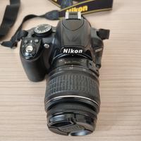 Nikon D3100 con zoom 300 doppia batteria e Zaino