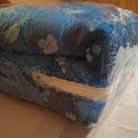 Trapunta materiale double face nuova