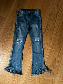 Jeans con frange e perle