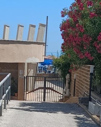 Posto auto privato coperto