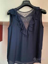 Blusa smanicata in pizzo Zara taglia M