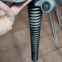 Supporto + molla vespa faro basso