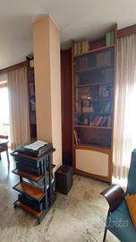 Libreria doppia cristallo con curva centrale
