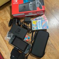Nintendo switch 1 con giochi, cover e accessori