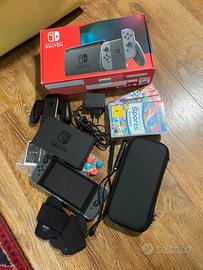 Nintendo switch 1 con giochi, cover e accessori