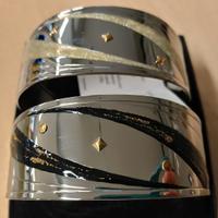 Bracciale acciaio oro largo aperto nero dorato