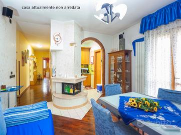 Luminoso Appartamento con Giardino e Garage