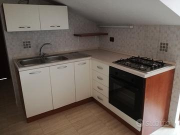 Trilocale mansardato con ascensore e balcone