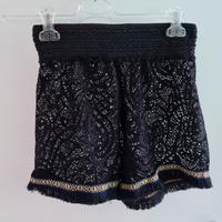 Pantaloncini copricostume taglia unica