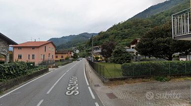 Bilocale a Gera Lario con posto auto e giardino