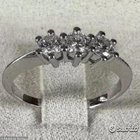 ANELLO TRILOGY ORO 18kt. E DIAMANTI NATURALI 0,52