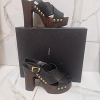 Zoccoli alti con cinturino 