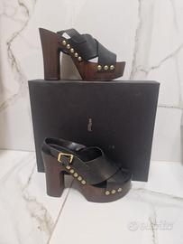 Zoccoli alti con cinturino 