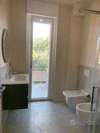 Elegante trilocale in piccola palazzina