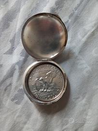 scatola argento con dollaro