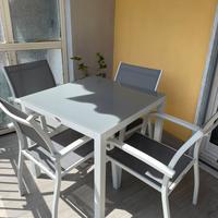 Tavolo da esterno con sedie piano in vetro